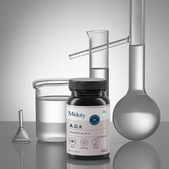 Miduty A.D.K Supplement bottle with laboratory equipment on a reflective surface, showing Science Backed - 30-main