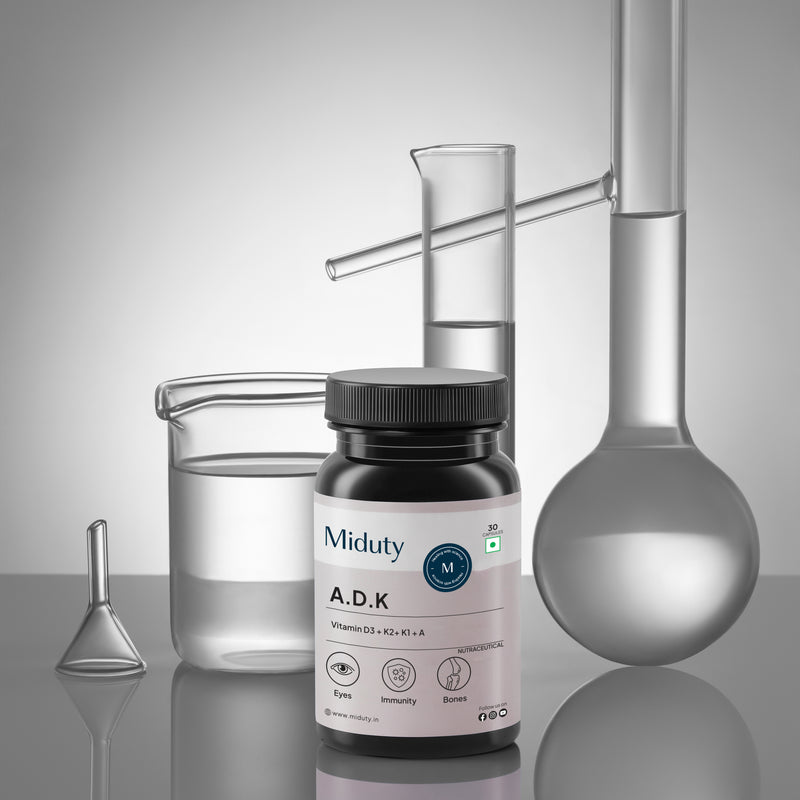 Miduty A.D.K Supplement bottle with laboratory equipment on a reflective surface, showing Science Backed